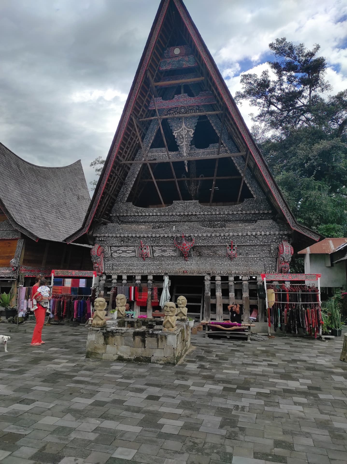 Traditional Batak house and woven ulos at Kampung Ulos
